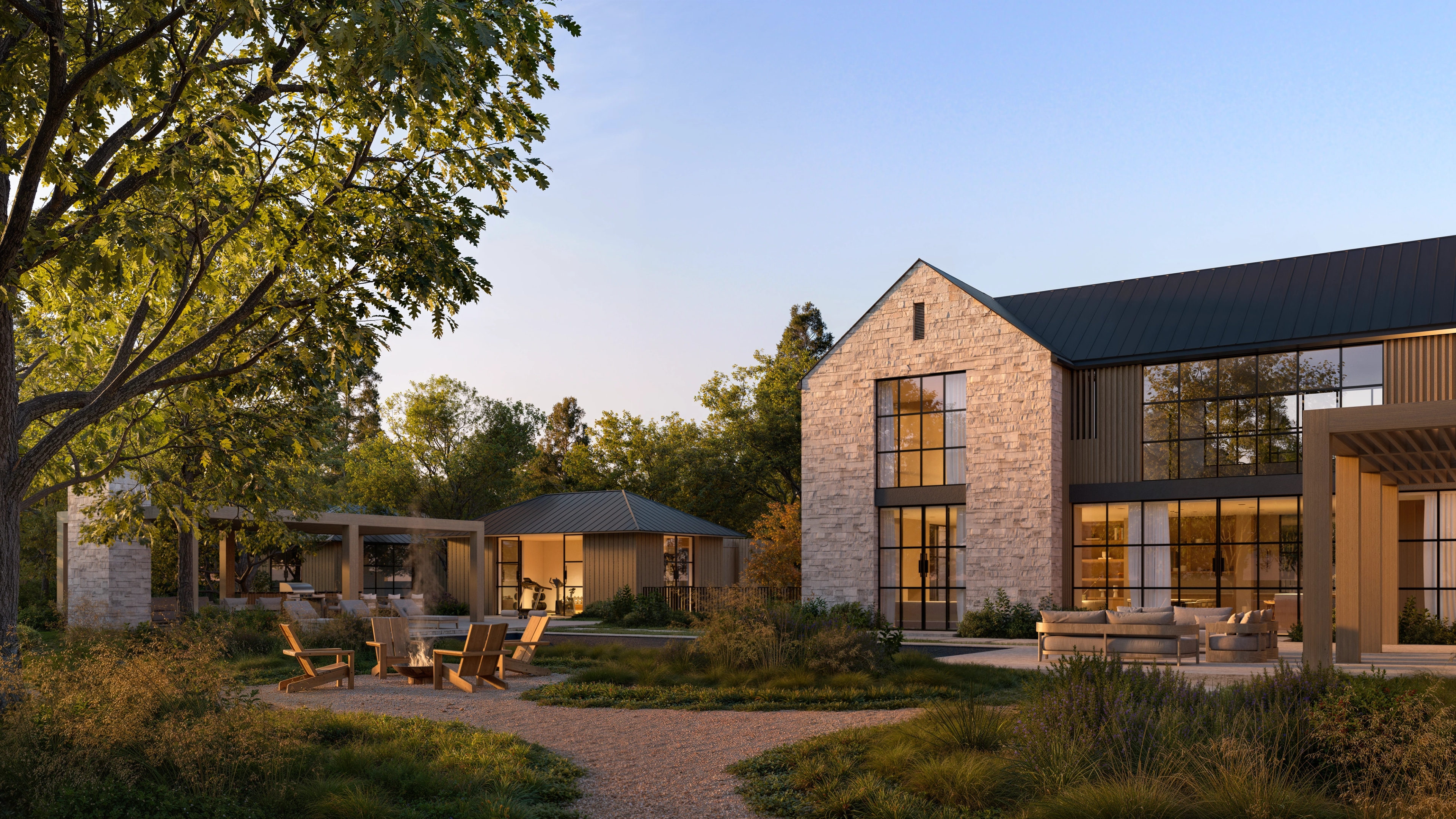 Courtyard with outdoor sofa and stone facade at Elena House
